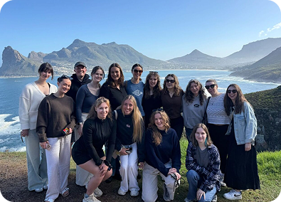 Group standing on cliff